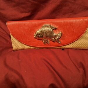 Mud Pie Red and Tan Clutch with Gold Fish Accent